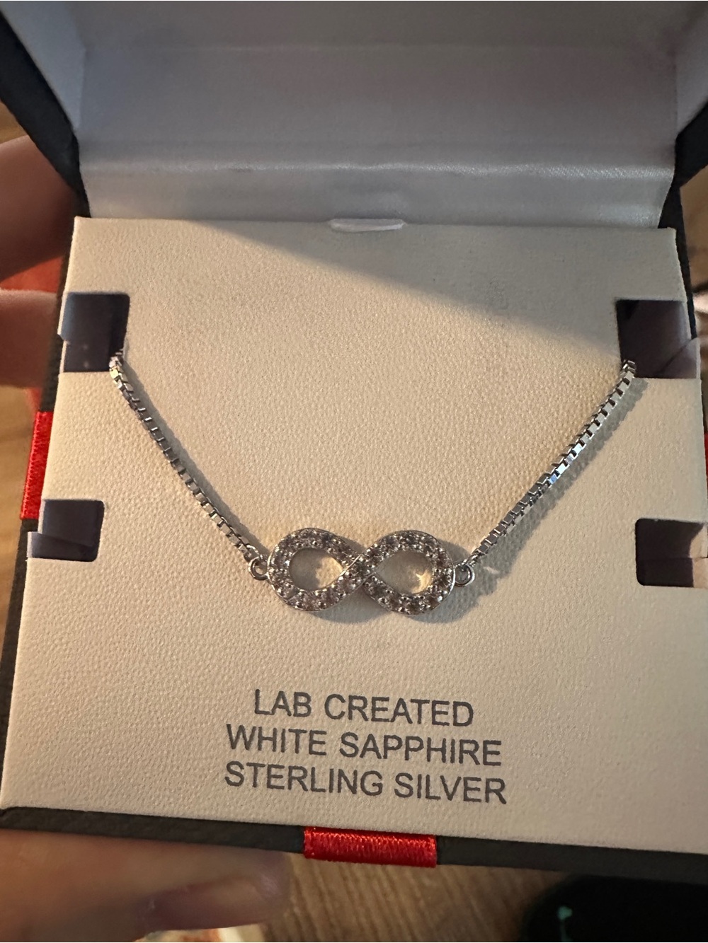NEW - Sterling Silver Infinity Bracelet with White Sapphires